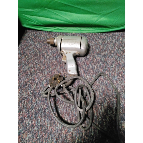 76 - A collection of 3 drills. To include Black & Decker corded electric drill, Black & Decker BD155RT ha... 