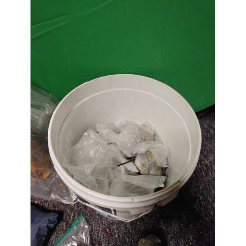 80 - A collection of garden items. To include false stones, string, plant food, bird feeder, pruners, was... 