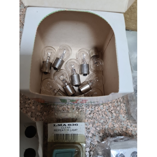 92 - A collection of vehicle side light bulbs and indicator light bulbs etc. Also includes a Classic Car ... 