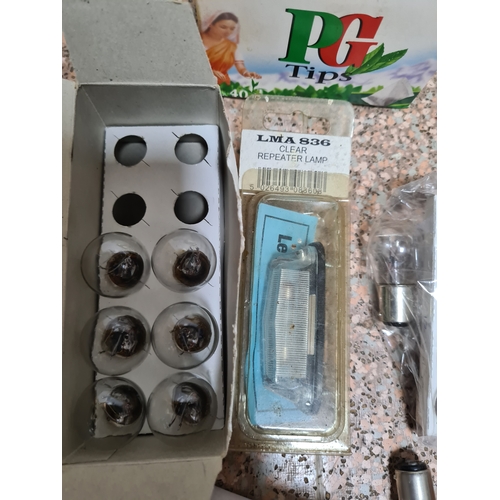 92 - A collection of vehicle side light bulbs and indicator light bulbs etc. Also includes a Classic Car ... 