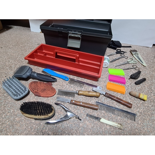 93 - A collection of vintage Dog / pet grooming tools to include, combs, hair brushes, scissors and pen k... 