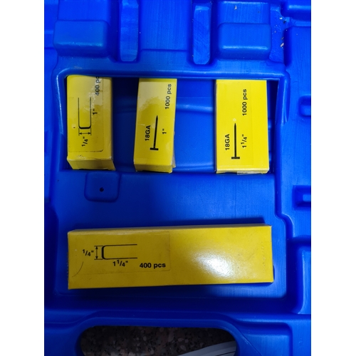 94 - A Draper Combination Nailer /Stapler Air Tool Kit in a plastic box with additional staples and heavy... 