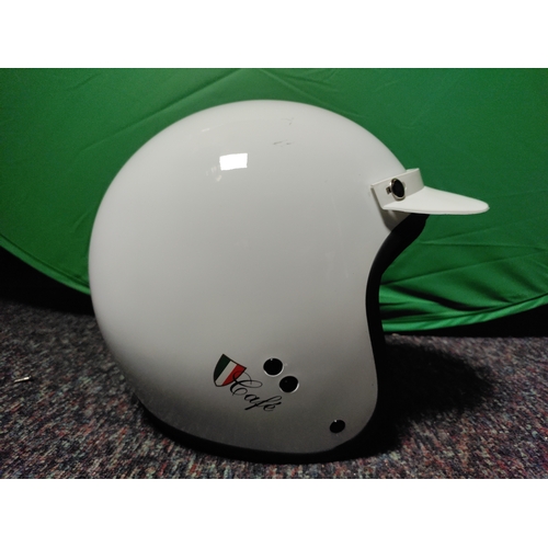 103 - A open-face motorcycle helmet with Italian flag decorations.