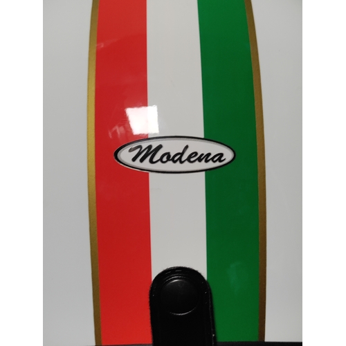 103 - A open-face motorcycle helmet with Italian flag decorations.