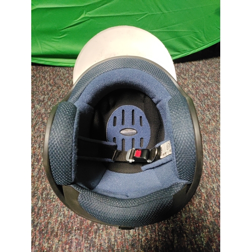 103 - A open-face motorcycle helmet with Italian flag decorations.