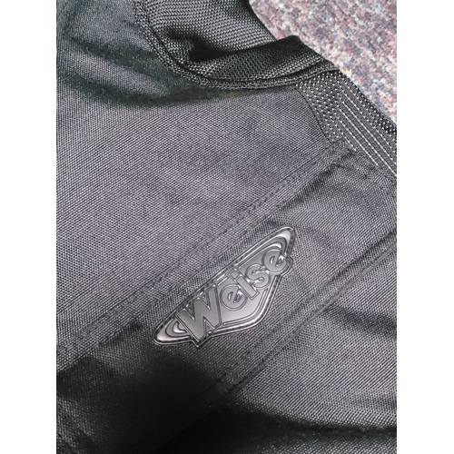 109 - A collection of protective clothing. To include 2 pairs of weise motorcyclist trousers one size XXL,... 