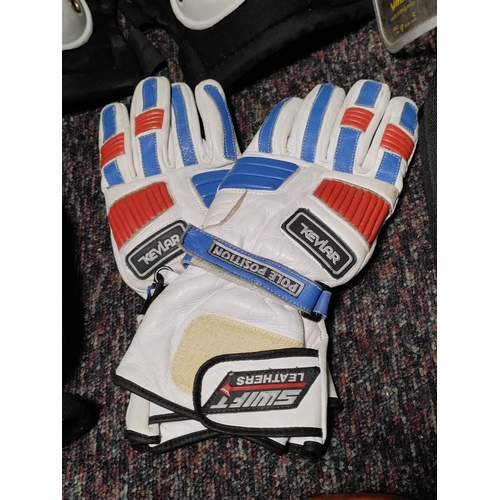 116 - A collection of protective equipment. To include black spur knee pads, Stihl safety helmet, rolson k... 