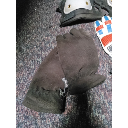 116 - A collection of protective equipment. To include black spur knee pads, Stihl safety helmet, rolson k... 