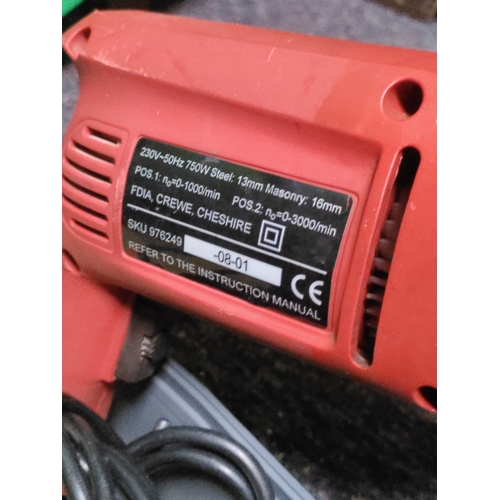 119 - A champion corded impact drill.