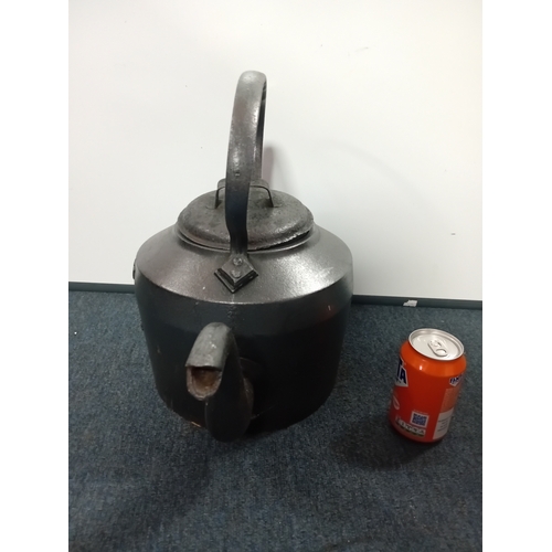 A cast iron kettle made by 