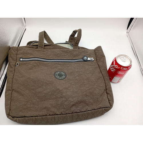 282 - A large green Kipling handbag