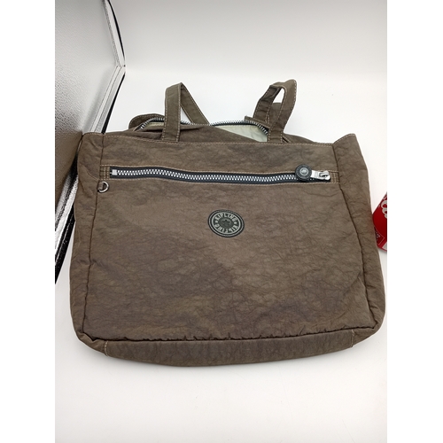 282 - A large green Kipling handbag