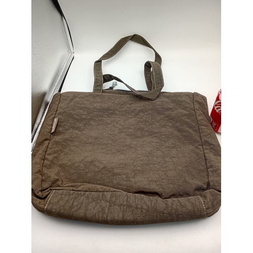 282 - A large green Kipling handbag