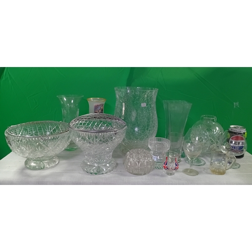 14 - A collection of glassware including vases, candle holders and drink ware. Some damage as shown in ph... 