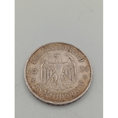 218 - 1934 German 5 marks .900 silver. High Grade.