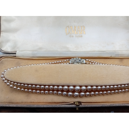 356 - A vintage omar de luxe Pearl necklace.