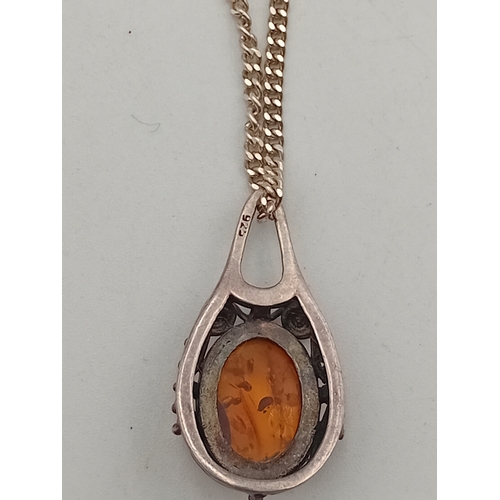 357 - A stamped 925 silver amber pendant on a stamped 925 silver necklace.