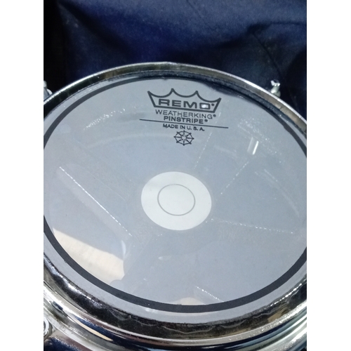 144 - A remo rototom drum, with carry case and stand.