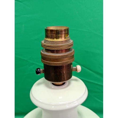 25 - A vintage Wedgwood Queensware Embossed Grape vine table lamp in cream. The lamp holder is slightly l... 