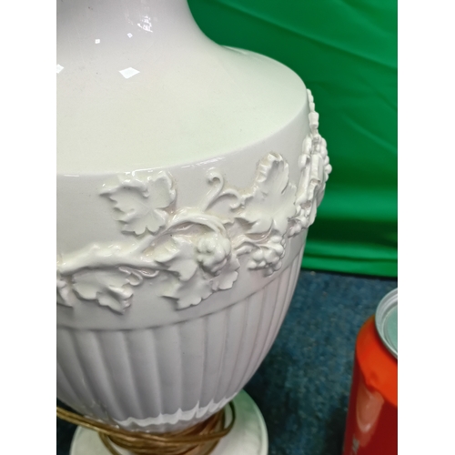 25 - A vintage Wedgwood Queensware Embossed Grape vine table lamp in cream. The lamp holder is slightly l... 