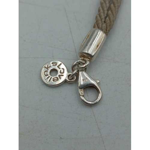 366 - A pair of bracelets, one 