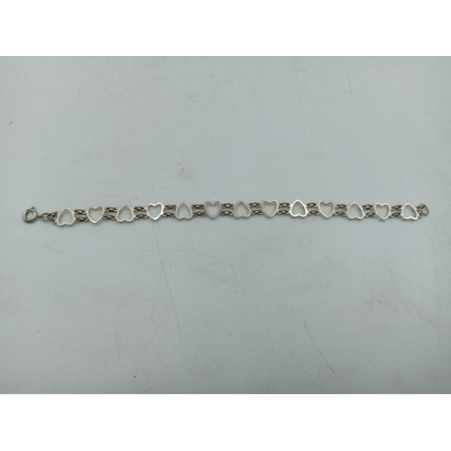 366 - A pair of bracelets, one 