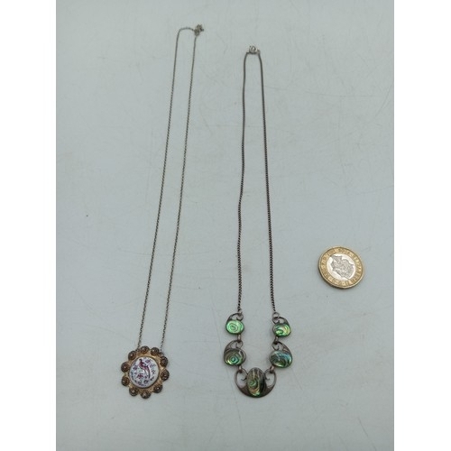 368 - A pair of necklaces, one stamped 