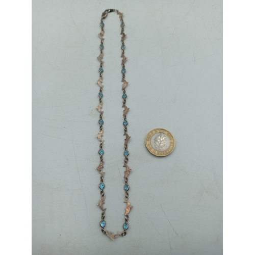 371 - A dolphin and Blue stone necklace stamped with 