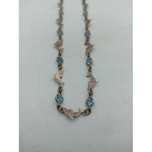 371 - A dolphin and Blue stone necklace stamped with 
