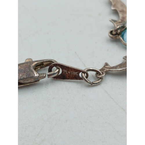 371 - A dolphin and Blue stone necklace stamped with 