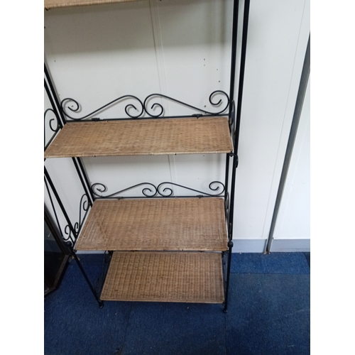 58 - A Collapsible Wrought Iron and wicker shelving unit. Measures H 168cm x W 70cm x D 27cm. When collap... 
