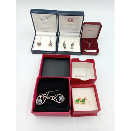 377 - Two pairs of silver earrings and a silver necklace with a pink stone. one yellow metal and one white... 