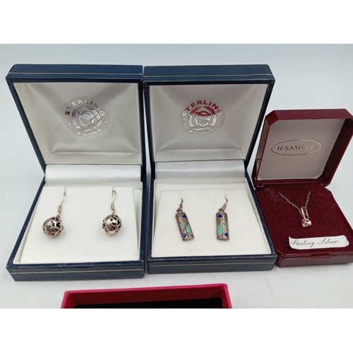 377 - Two pairs of silver earrings and a silver necklace with a pink stone. one yellow metal and one white... 