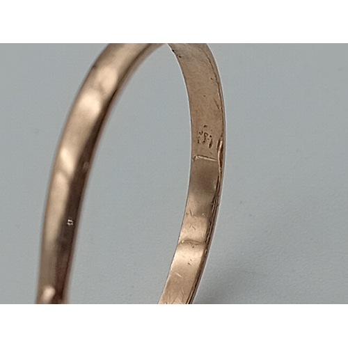 389 - A tested 9ct gold ring set with smokey Quartz. Size T