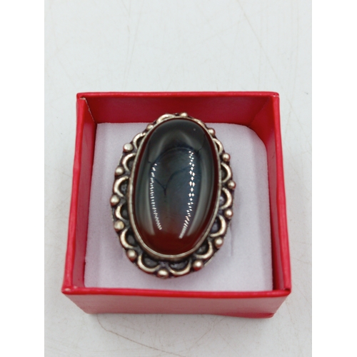 381 - A vintage stamped 925 silver ring set with a large Amber coloured stone. Size O