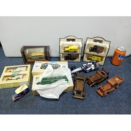 156 - A collection of vintage toy vehicles, brands include Lledo, Days-Gone, Corgi, and Mattel.
