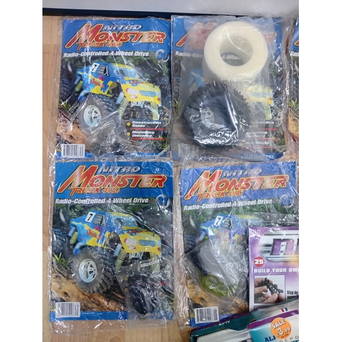 160 - A collection of vintage DIY Nitro Monster Truck 4WD RC sealed magazines including Nitro Racer & a AL... 