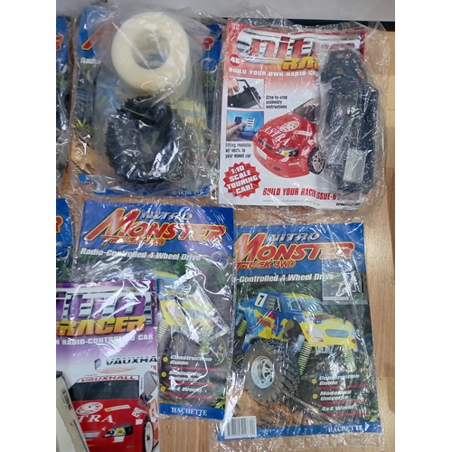 160 - A collection of vintage DIY Nitro Monster Truck 4WD RC sealed magazines including Nitro Racer & a AL... 