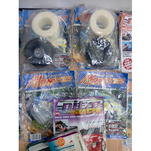 160 - A collection of vintage DIY Nitro Monster Truck 4WD RC sealed magazines including Nitro Racer & a AL... 
