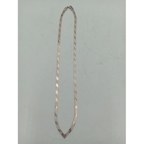 364 - A collection of silver items. To include; a vintage stamped 925 herringbone necklace, a stamped 925 ... 