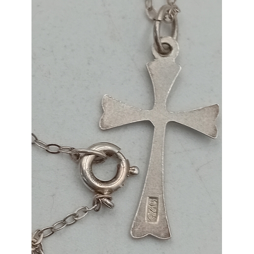 365 - Two silver necklaces. One has a stamped 925 elephant pendant and the other has a stamped 925 crucifi... 