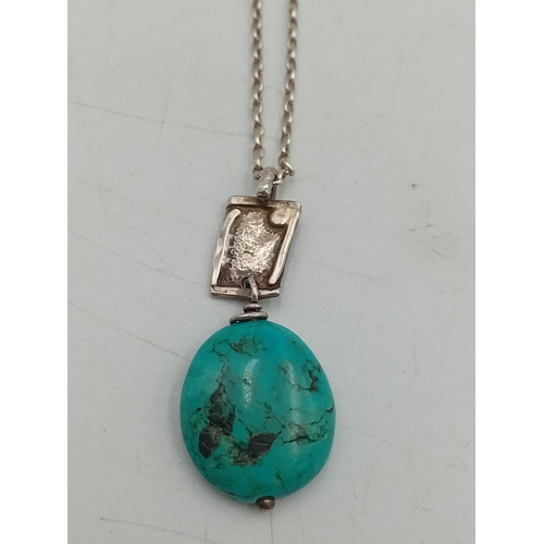 370 - Two stamped 925 silver necklaces. One has a turquoise colour stone and one has a silver mounted pend... 