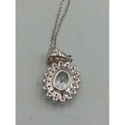 372 - A stamped 925 silver necklace and earring set. Chain is tangled.