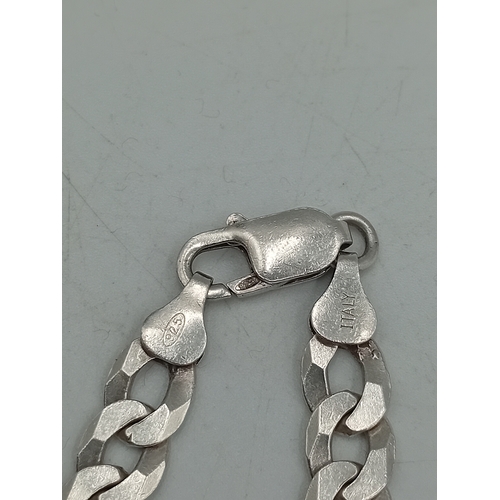 373 - A long stamped 925 silver cuban link chain necklace. Length 24 inches