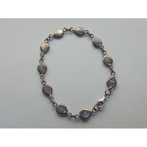 378 - A stamped 925 silver teardrop bracelet.