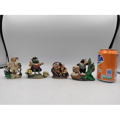 167 - A set of 4 lead The wind in the willows figures. To include Mr. Toad, Ratty, Mr. Mole & Caroling mic... 