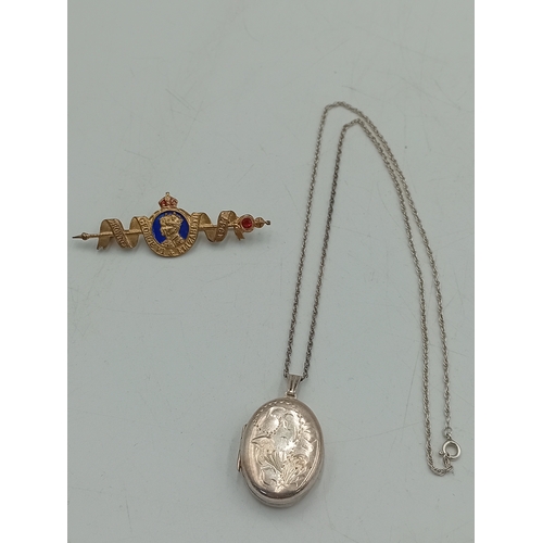 381 - A hallmarked silver locket on a stamped Sterling chain and a 1937 coronation brooch pin.