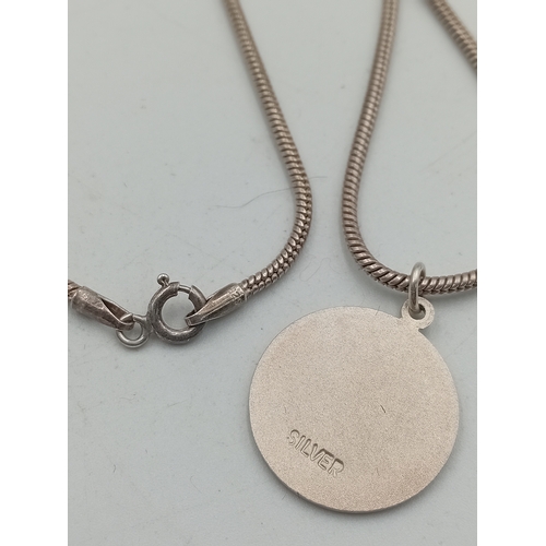 390 - A collection of three silver necklaces. To include; a stamped 925 silver necklace with a stamped sil... 