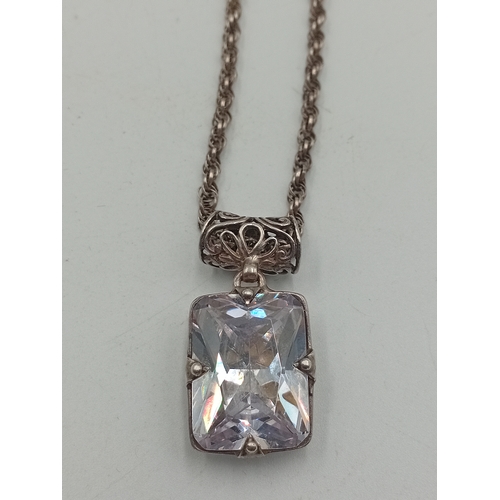 390 - A collection of three silver necklaces. To include; a stamped 925 silver necklace with a stamped sil... 