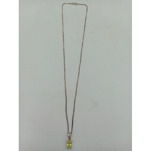 390 - A collection of three silver necklaces. To include; a stamped 925 silver necklace with a stamped sil... 